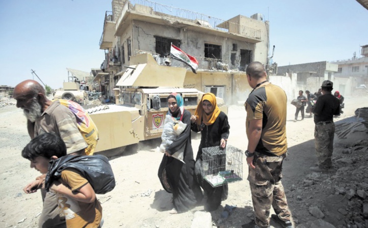 Près de 20.000 civils demeurent pris au piège des combats acharnés à Mossoul Près de 20.000 civils demeurent pris au piège des combats acharnés à Mossoul