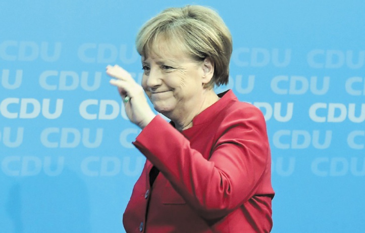 En Allemagne, Merkel élue chancelière pour un quatrième mandat difficile En Allemagne, Merkel élue chancelière pour un quatrième mandat difficile