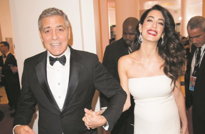 Les époux Clooney donnent 100.000 dollars pour les enfants migrants