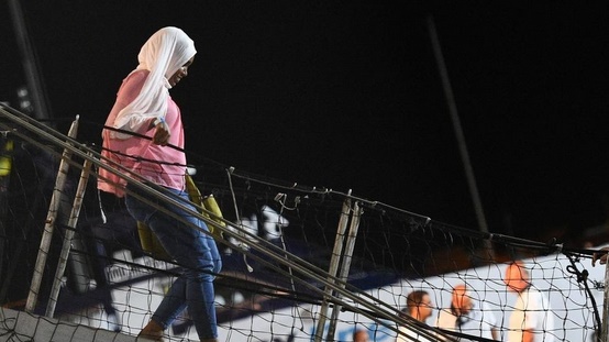 Les migrants de l'Open Arms débarquent à Lampedusa Les migrants de l'Open Arms débarquent à Lampedusa