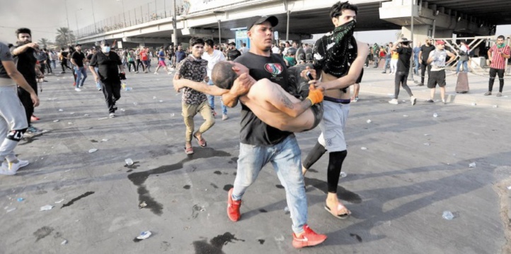 Dans l'Irak en révolte, compter les morts est une tâche dangereuse Dans l'Irak en révolte, compter les morts est une tâche dangereuse