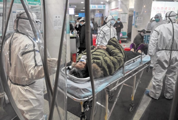 A Wuhan, des médecins mal protégés travaillent dans la peur A Wuhan, des médecins mal protégés travaillent dans la peur