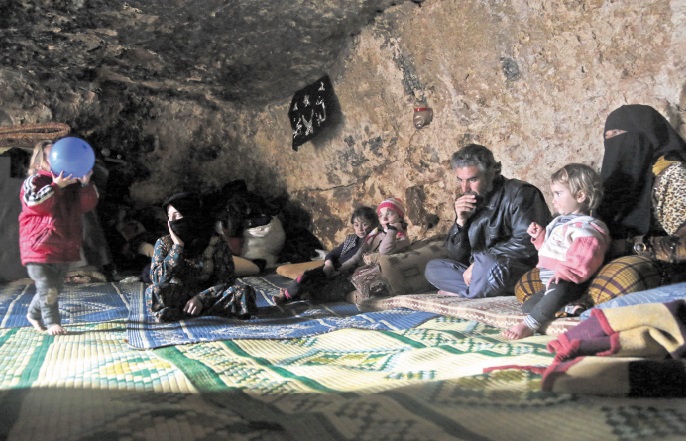 En Syrie, vivre sous terre pour échapper à la guerre