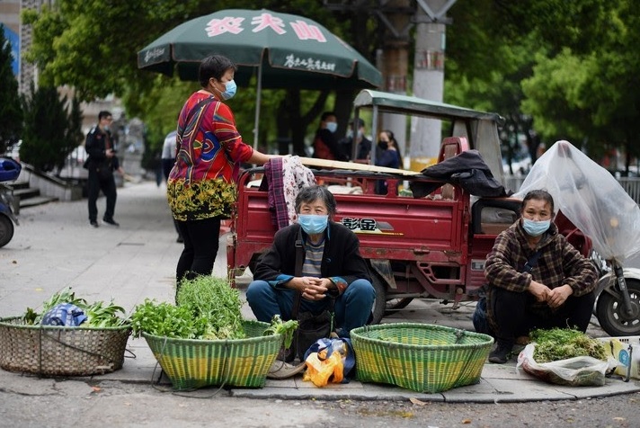 Même sans bouclage, la peur demeure dans le berceau du virus en Chine