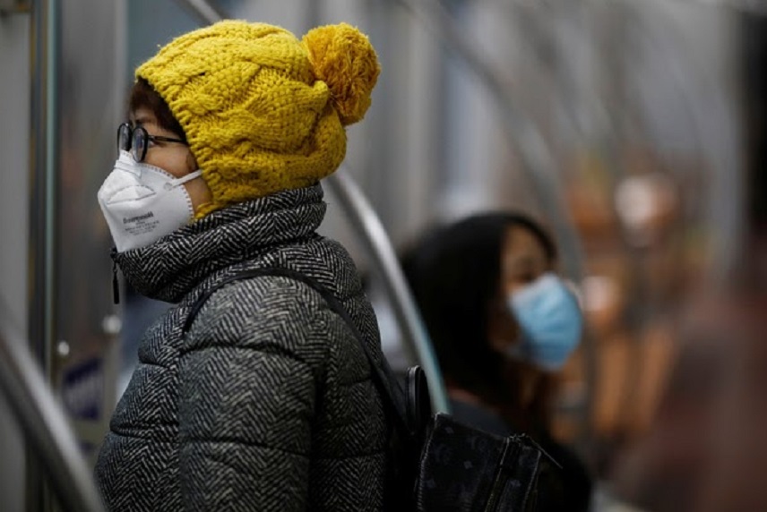 Les masques omniprésents en Asie, mais leur efficacité fait débat