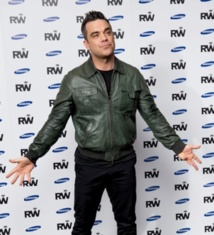 Ces célébrités qui ont pris du muscle : Robbie Williams Ces célébrités qui ont pris du muscle : Robbie Williams