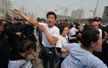 Manifestation à Pékin de familles des passagers du Boeing malaisien