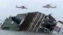 Course des plongeurs pour récupérer les corps du ferry sud-coréen naufragé