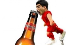 Insolite : Le coup de dents de Suarez Insolite : Le coup de dents de Suarez