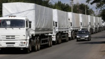 Les premiers camions russes du convoi humanitaire franchissent la frontière ukrainienne sans autorisation Les premiers camions russes du convoi humanitaire franchissent la frontière ukrainienne sans autorisation