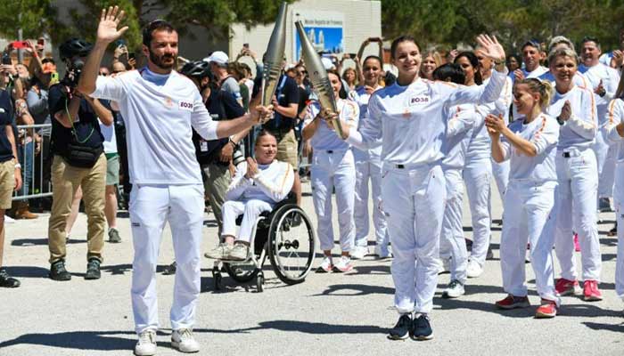 Avec la flamme olympique à Paris, l'ivresse attendue pour relancer les Olympiades Avec la flamme olympique à Paris, l'ivresse attendue pour relancer les Olympiades