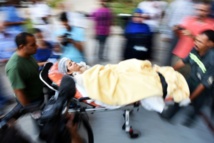 Fusillade contre un car de touristes devant un hôtel du Caire Fusillade contre un car de touristes devant un hôtel du Caire