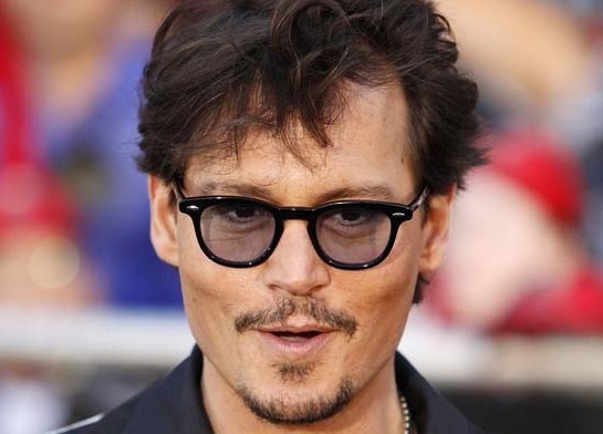 Johnny Depp prêt à tout pour ses enfants Johnny Depp prêt à tout pour ses enfants