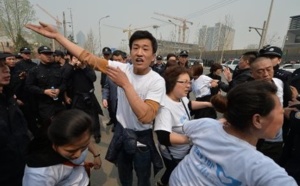 Manifestation à Pékin de familles des passagers du Boeing malaisien