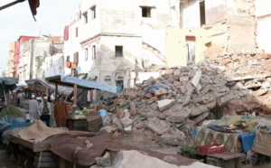 Abris de fortune et maisons menaçant ruine