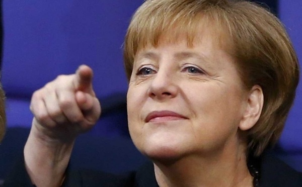 Merkel entame son troisième mandat par une visite à Paris